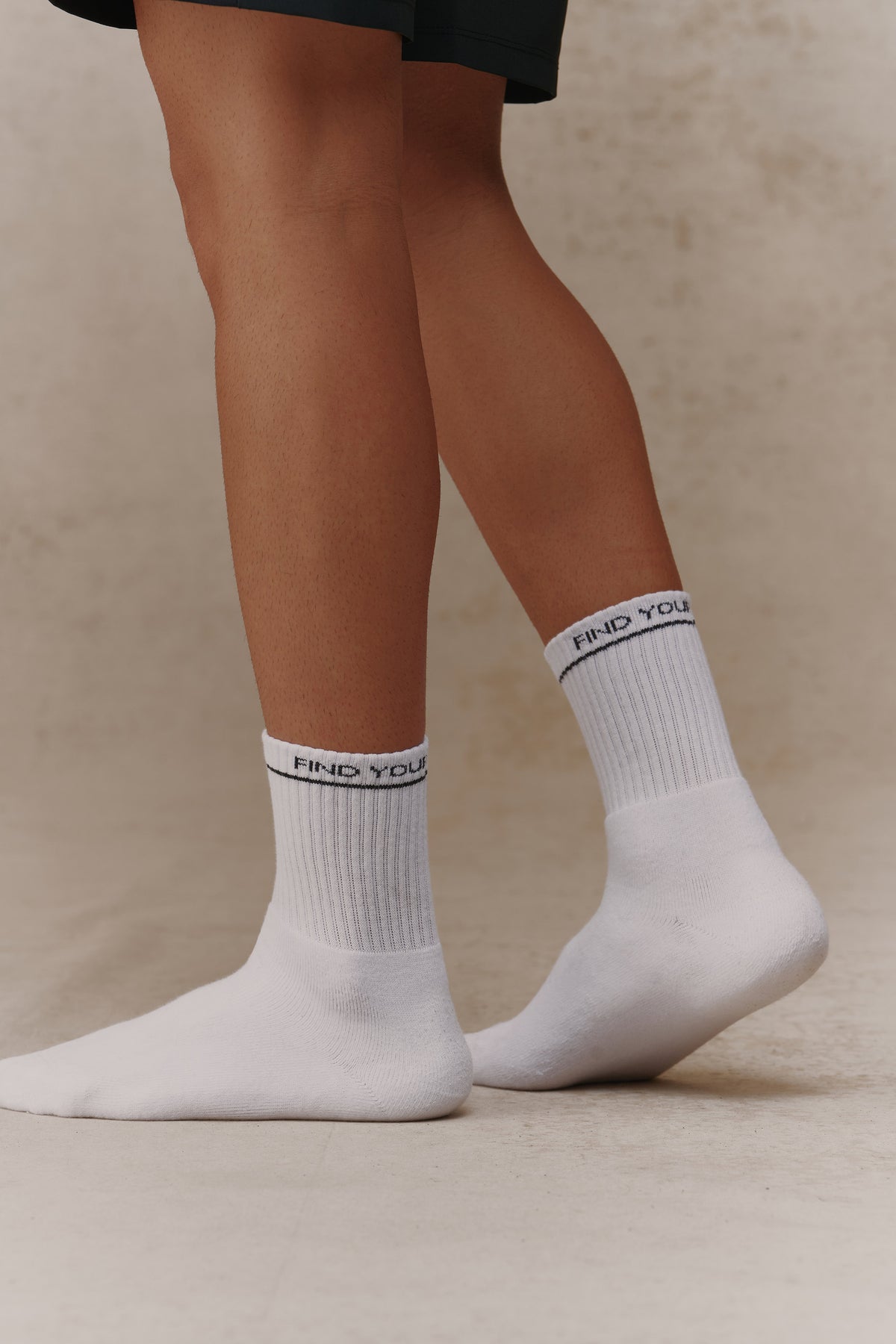 The find your antidote Essential Socks in White, side view