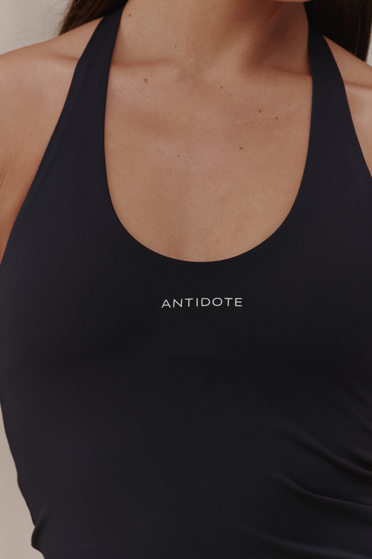 Scoop neckline of the built-in bra on the Halter Neck Flow