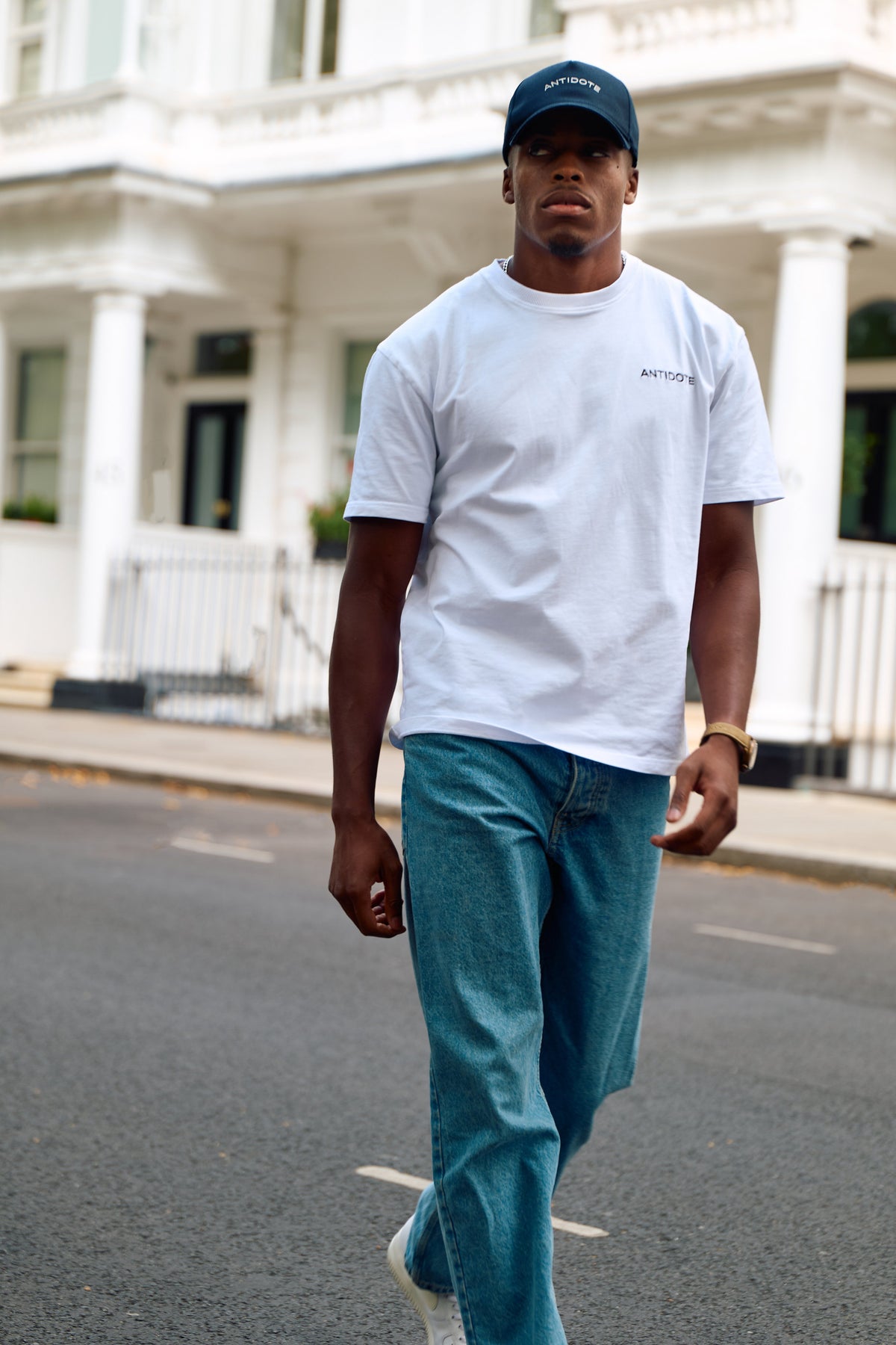 Man wearing the Antidote Reset Tee in Crisp White