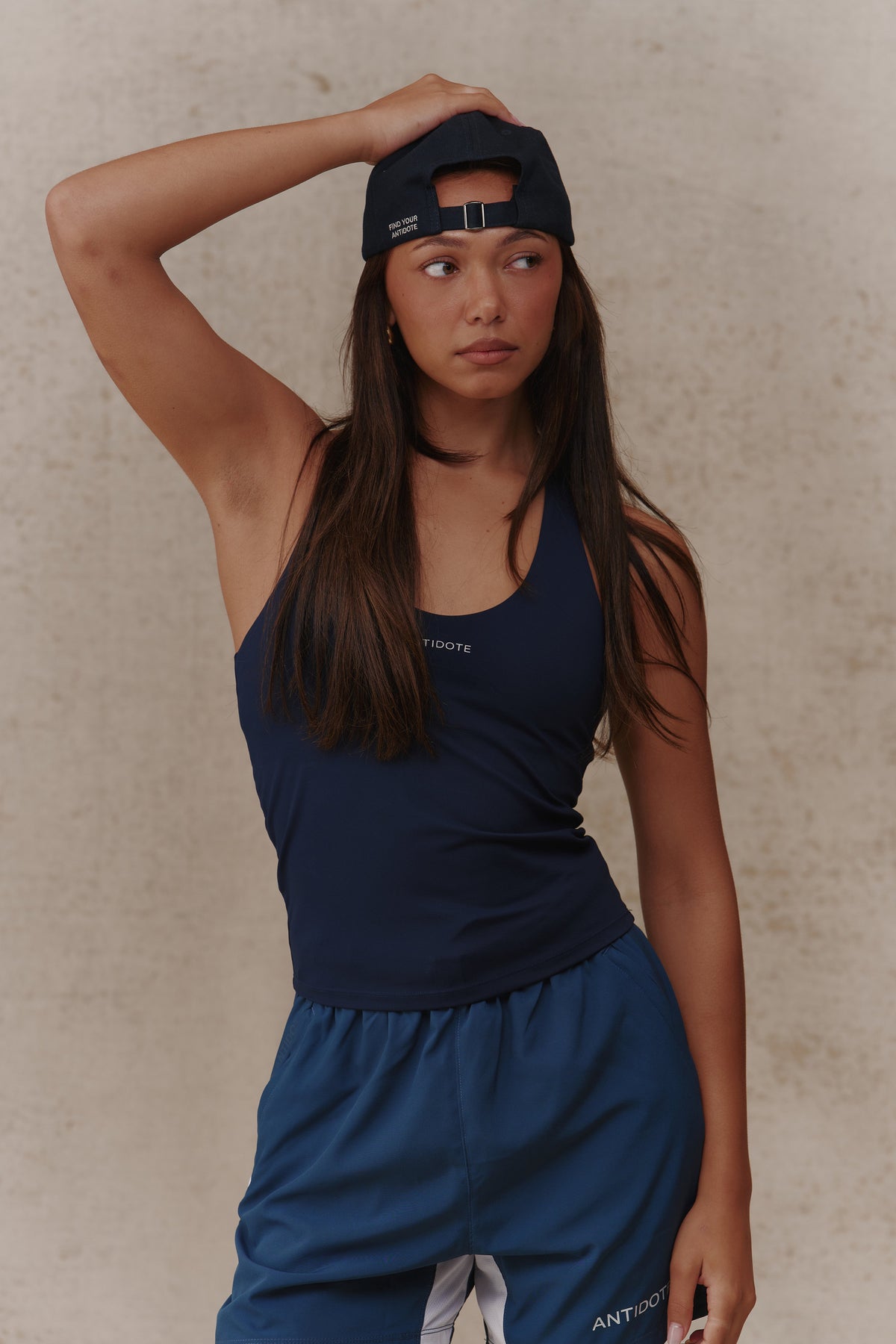 Woman wearing The Original Antidote Cap backwards