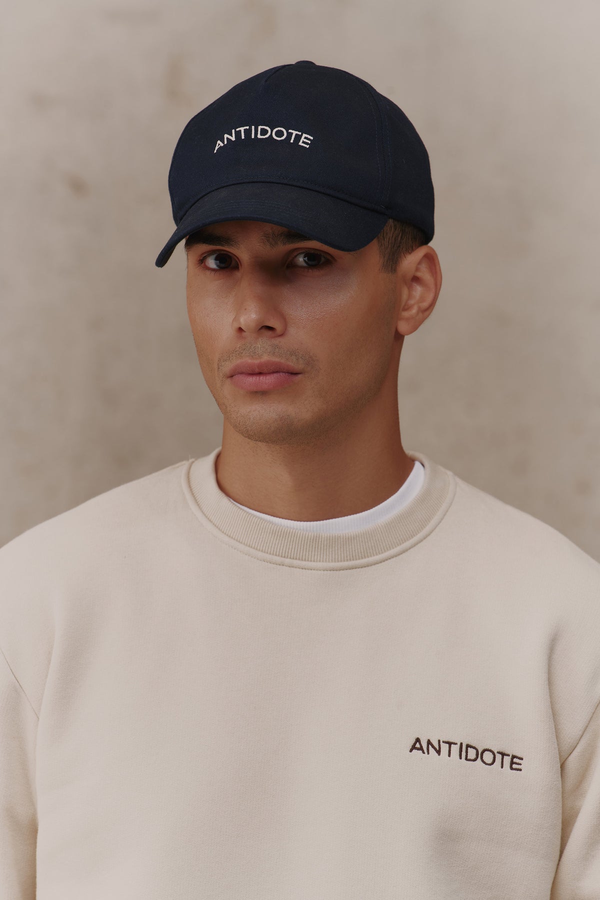 Man wearing The Original Antidote Cap in Deep Navy, front view