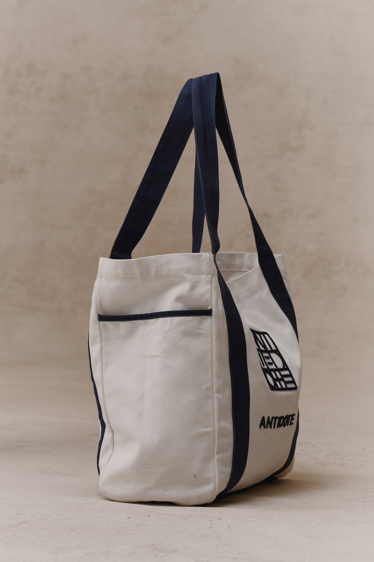 The Antidote Two Tone Tote in Ocean Blue, side view