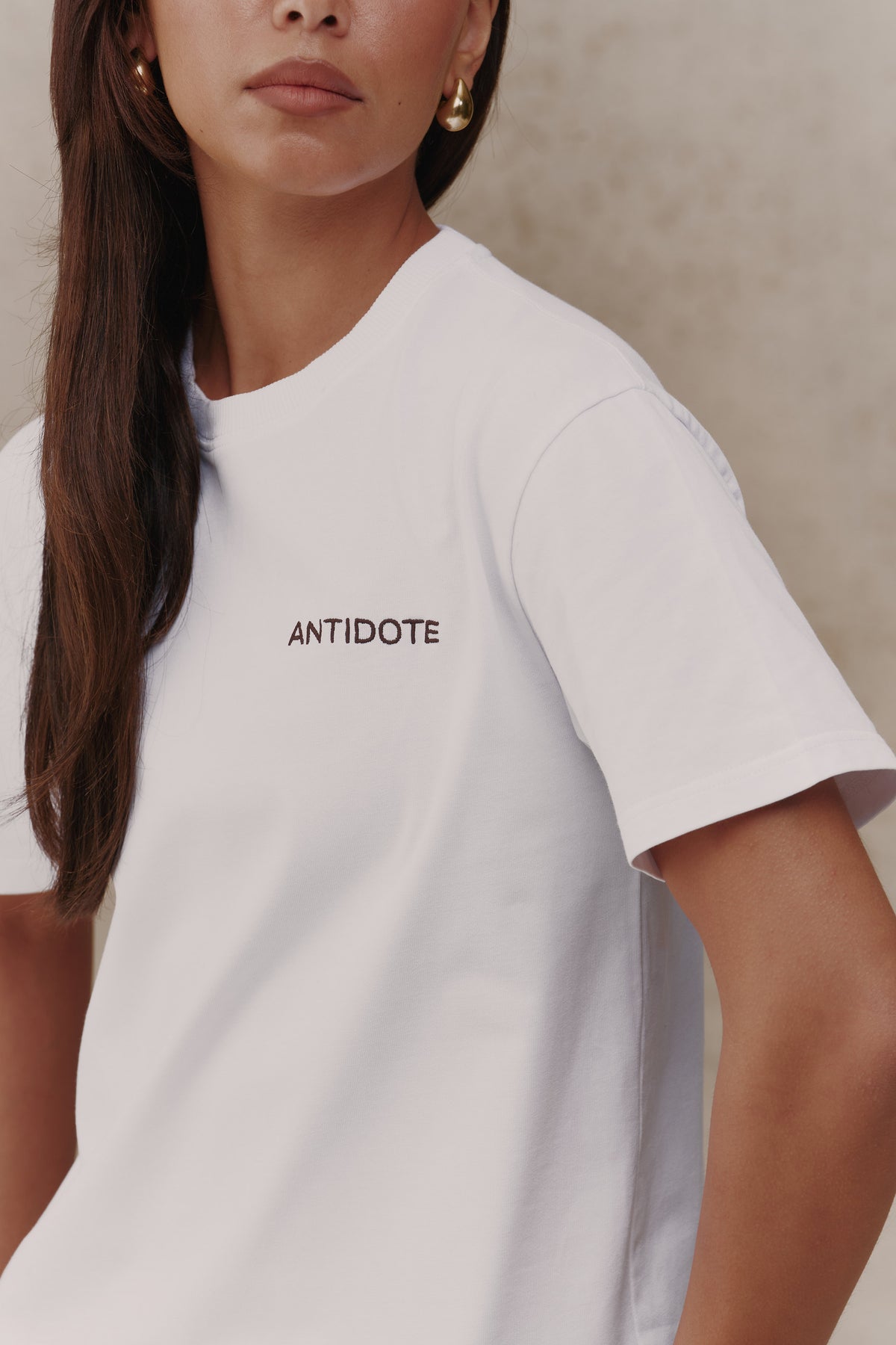 Ribbed neckline and chest embroidery on the Reset Tee